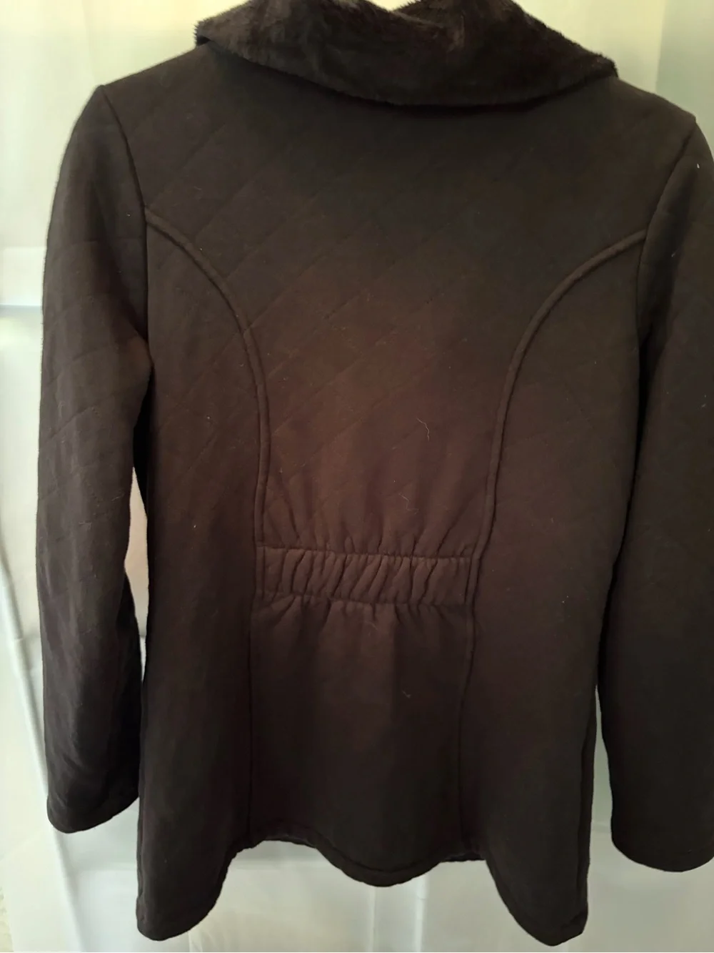 The North Face Women’s Dark Brown Quilted Puffer Jacket with Faux-Fur Collar